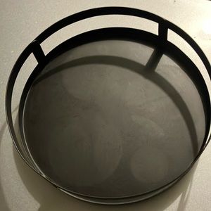 Lazy Susan spinning tray, black metal material.  Spins.